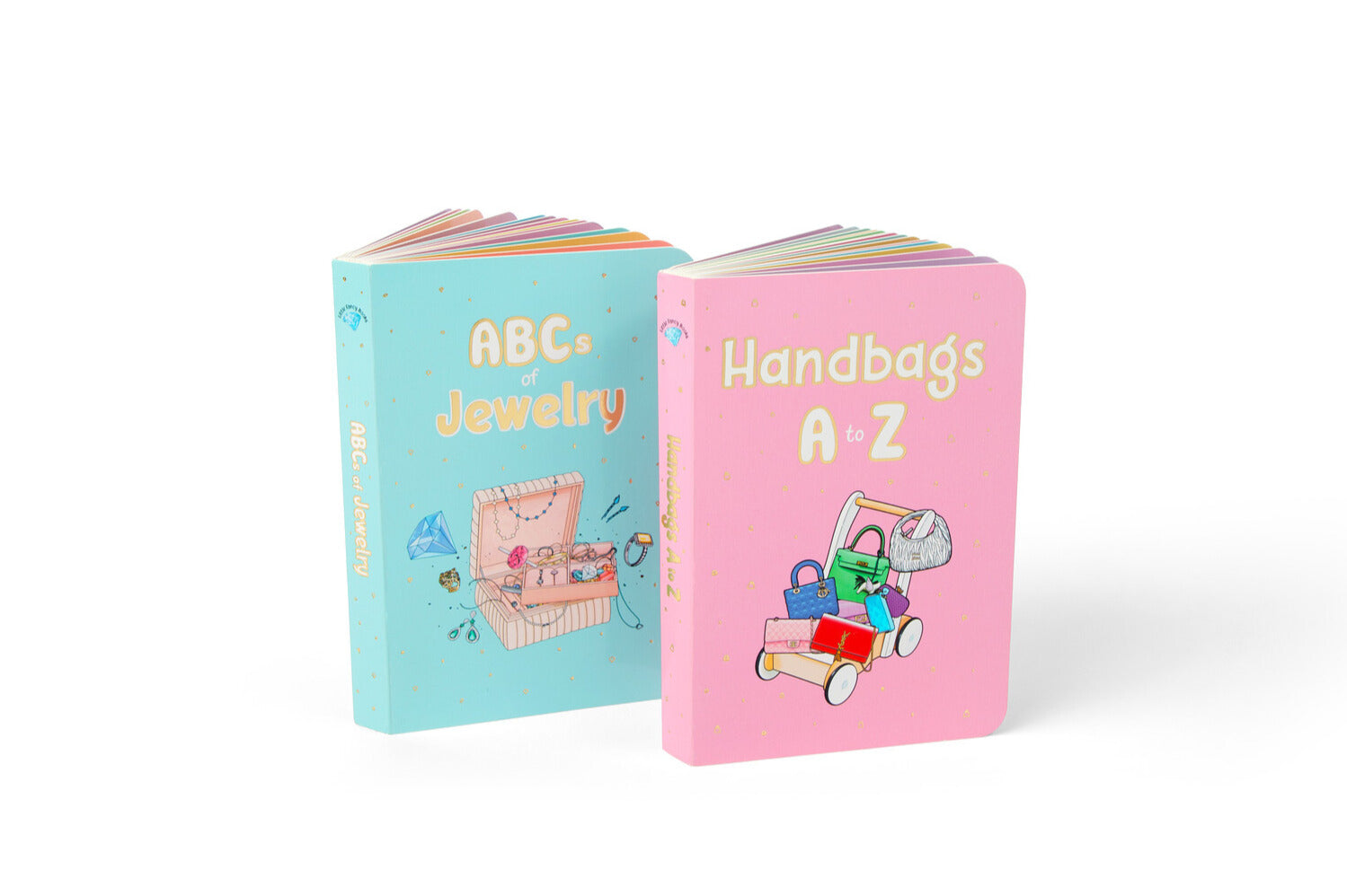 A pair of illustrated alphabet board books titled "ABCs of Jewelry" and "Handbags A to Z," featuring colorful covers with jewelry and handbag illustrations, perfect for learning the alphabet and about iconic brands from A to Z. Sold as a bundle and a great holiday gift.